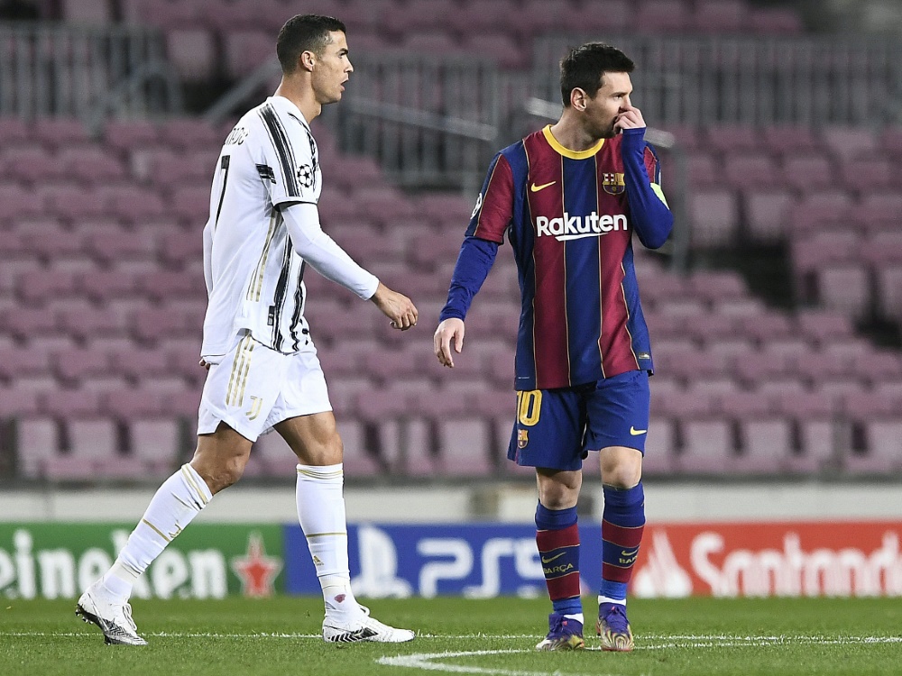 Ronaldo (l.) und Messi messen die Kräfte nun beim Schach (Foto: AFP/SID/JOSEP LAGO)