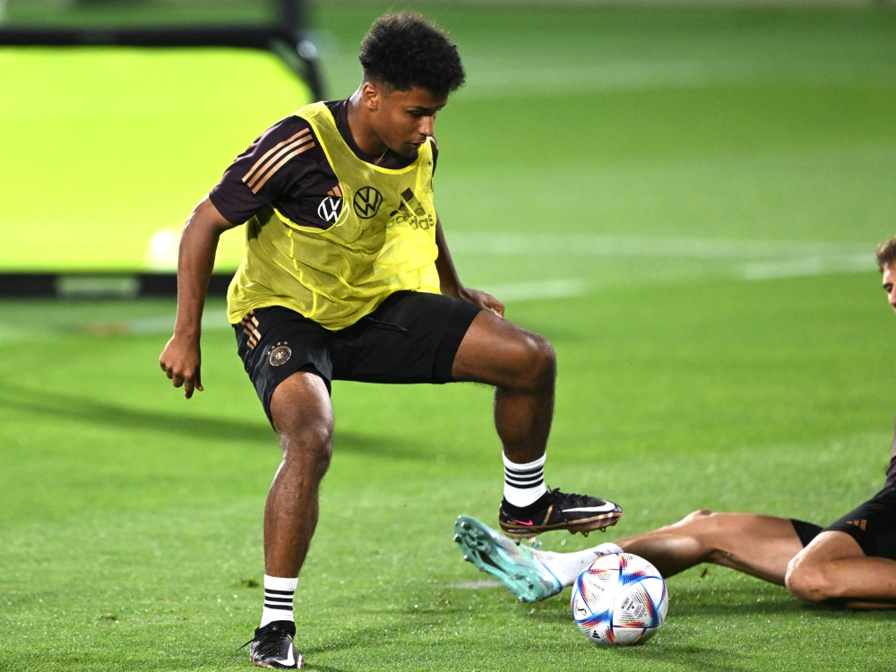 Karim Adeyemi ist aktuell mit Deutschland bei der WM (Foto: AFP/SID/INA FASSBENDER)